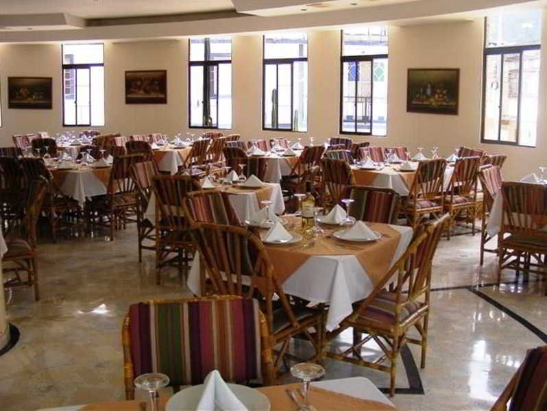 Casa Morales Hotel Internacional Y Centro De Convenciones Ibagué エクステリア 写真 The dining room at the hotel